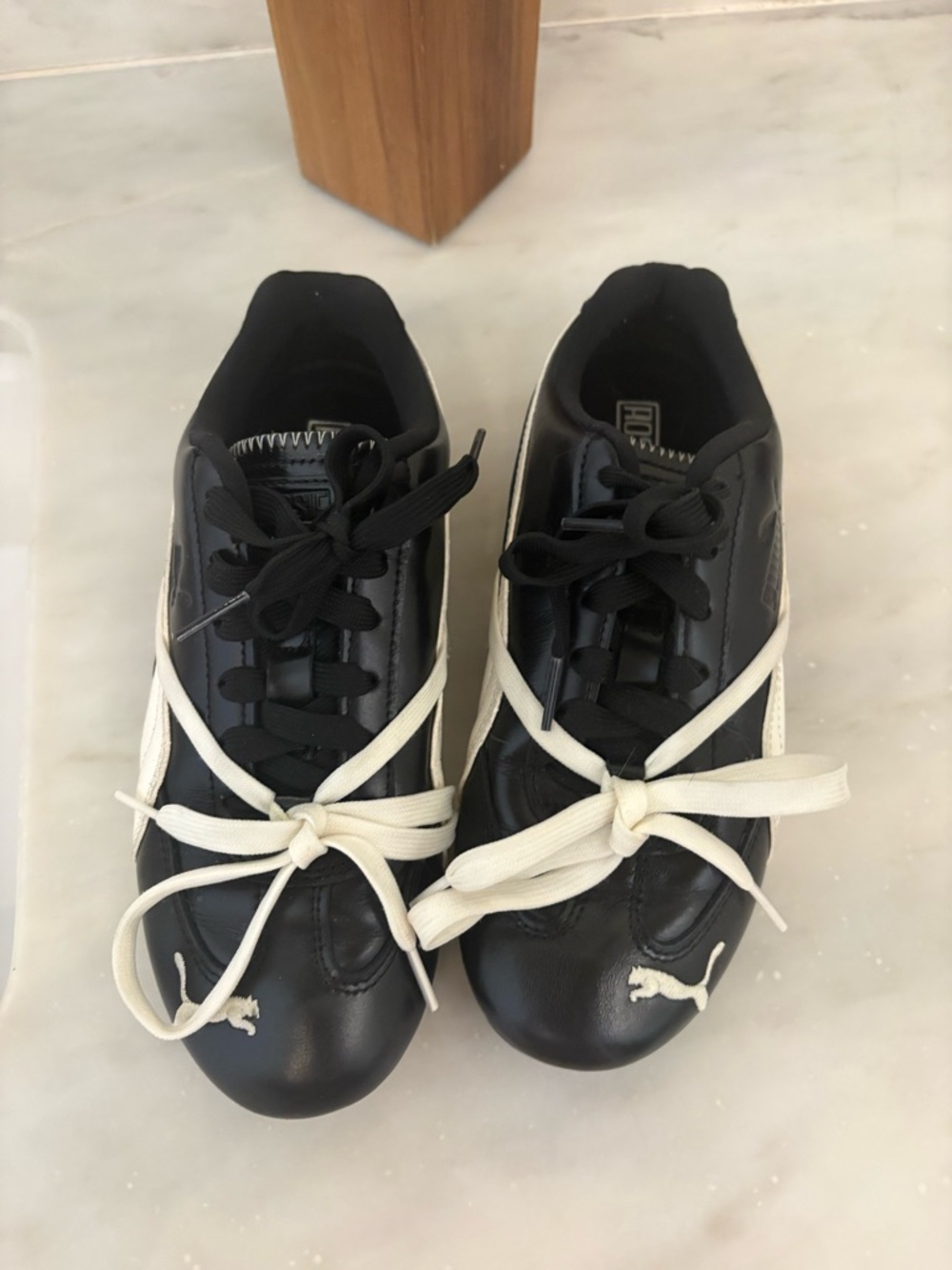 Puma Black Sneakers with White Stripes